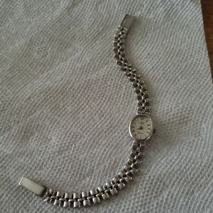 Geneve Quartz 14k white gold watch.